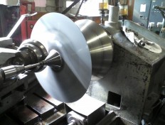 Image of spun cone on Flow Turn machine in process